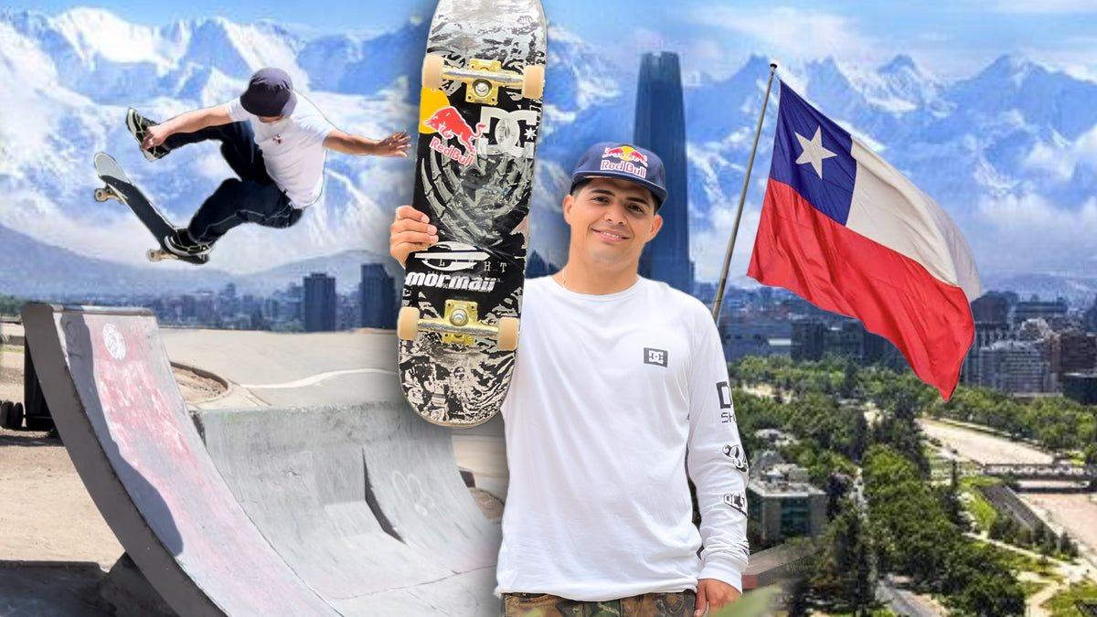 Skateboarding in Chile: Marcelo Jiménez with his board and the Chilean flag, the Andes and Santiago behind him. Photo by Mike Boisvert / The Skate Nomad