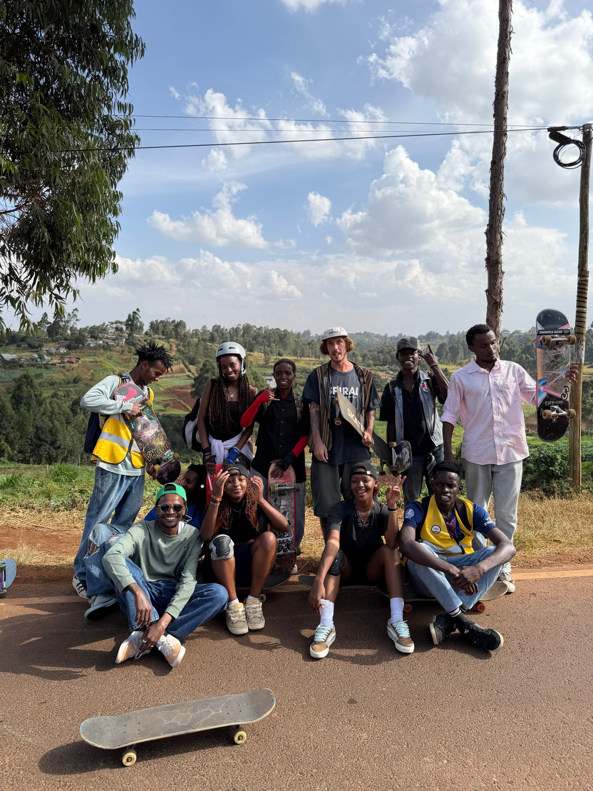 Skateboarding in Kenya — the Nairobi crew on a countryside road with Mike Boisvert — photo by Mike Boisvert / The Skate Nomad