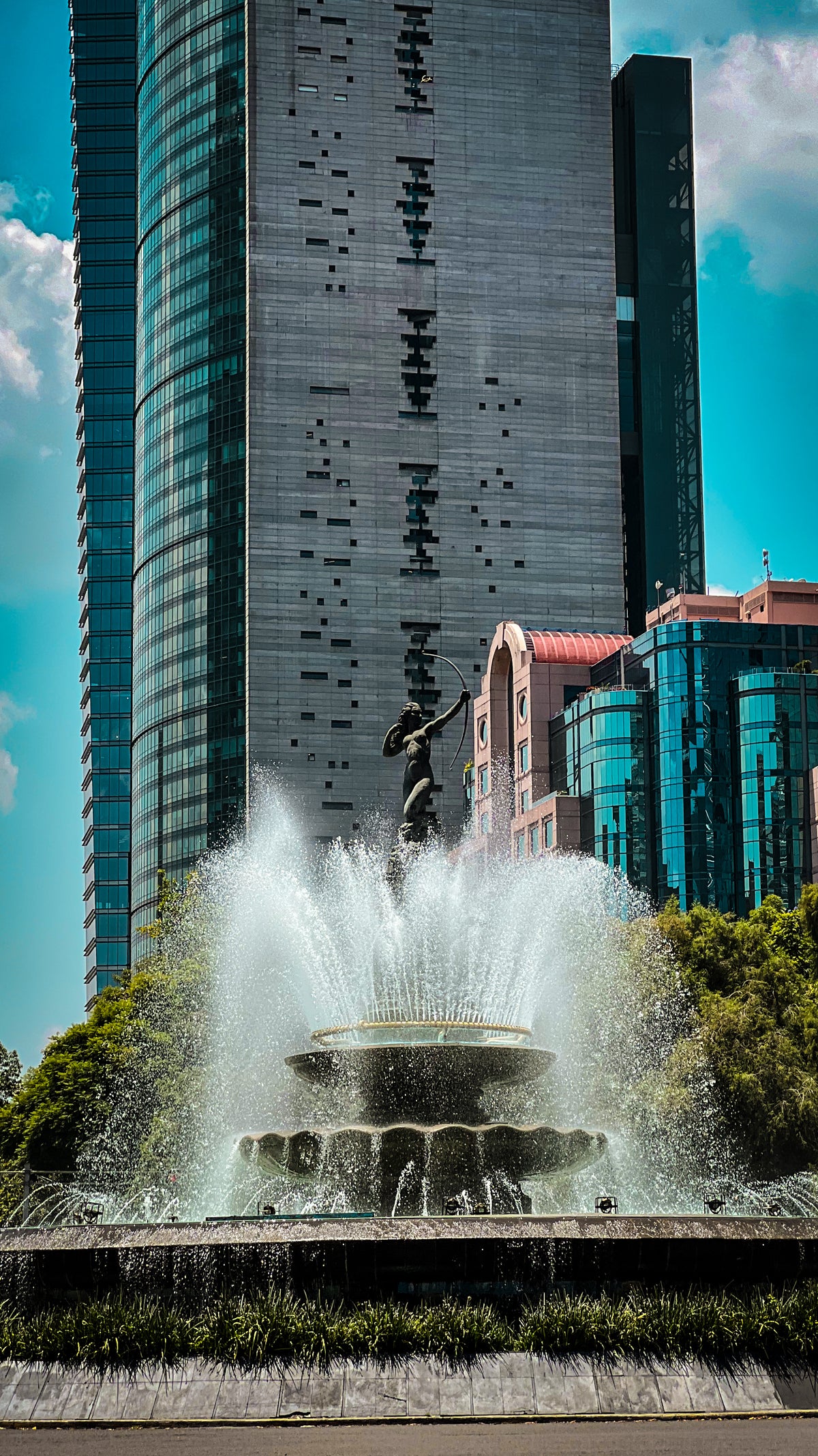 Mexico City: the Diana fountain on Paseo de la Reforma, towers behind. Photo by Mike Boisvert / The Skate Nomad