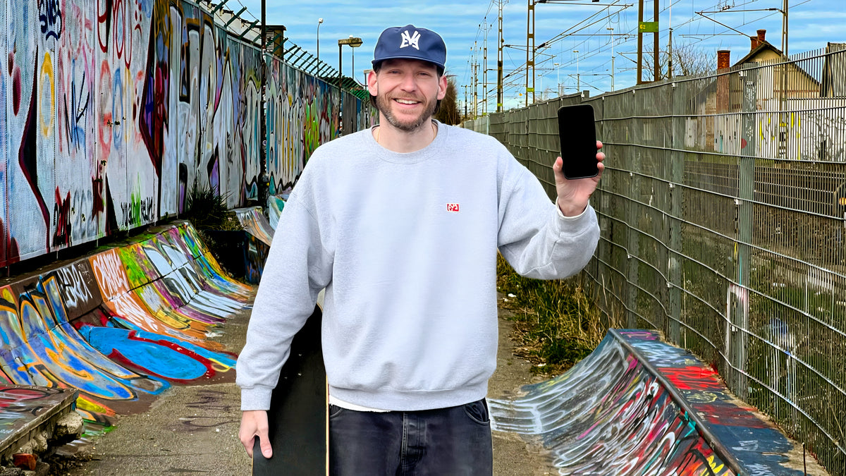 Skateboarding in Malmö, Sweden: Mike Boisvert with the Shinner spot app open on a graffiti-lined transition spot. Photo by Mike Boisvert / The Skate Nomad