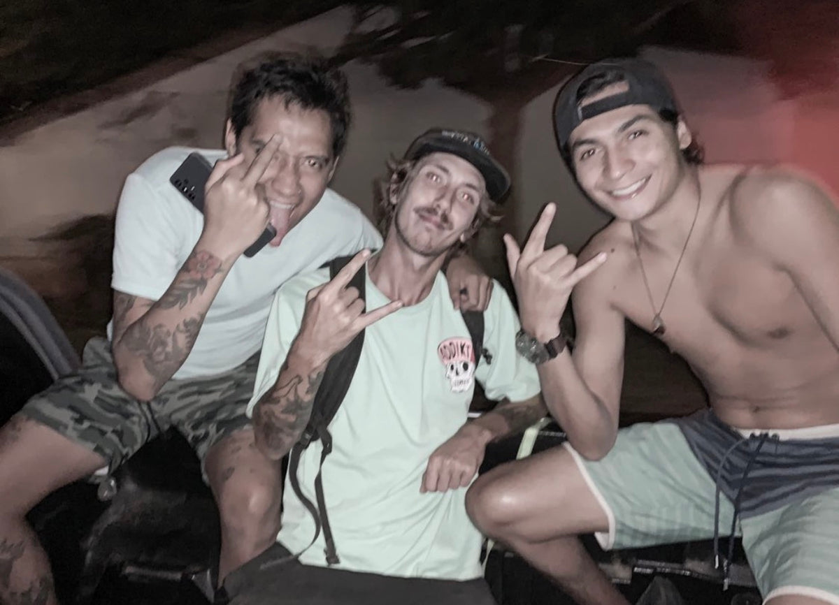 El Salvador: Mike Boisvert and two skaters on a night bus. Photo by Mike Boisvert / The Skate Nomad