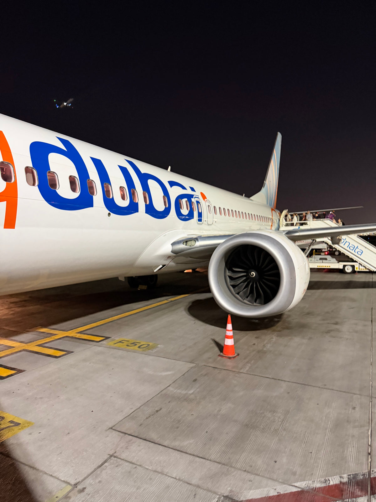 Oman: the plane on the tarmac at night. Photo by Mike Boisvert / The Skate Nomad