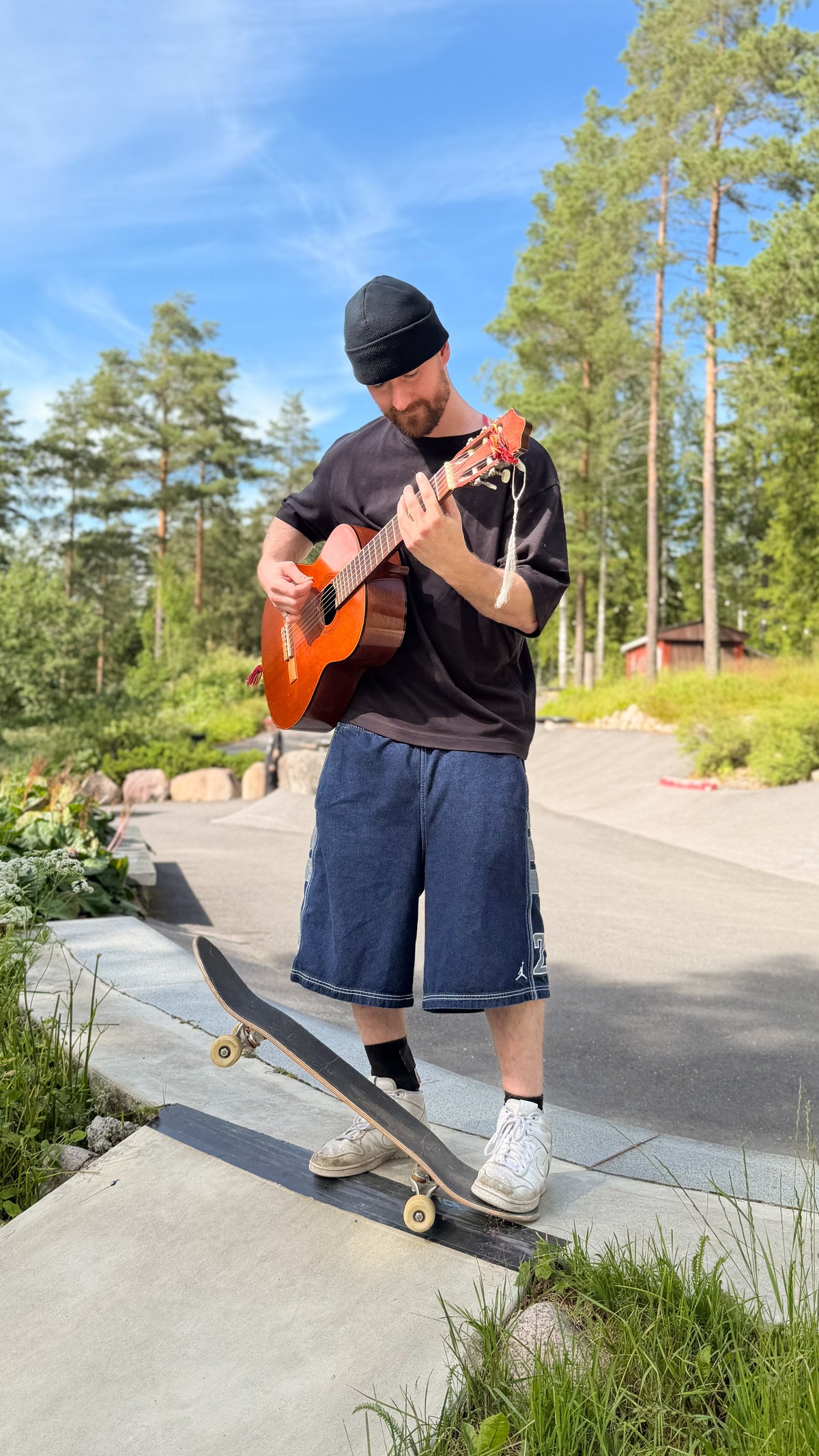 Finland: Mike Boisvert plays guitar at Havumäki Skate Ranch. Photo by Mike Boisvert / The Skate Nomad