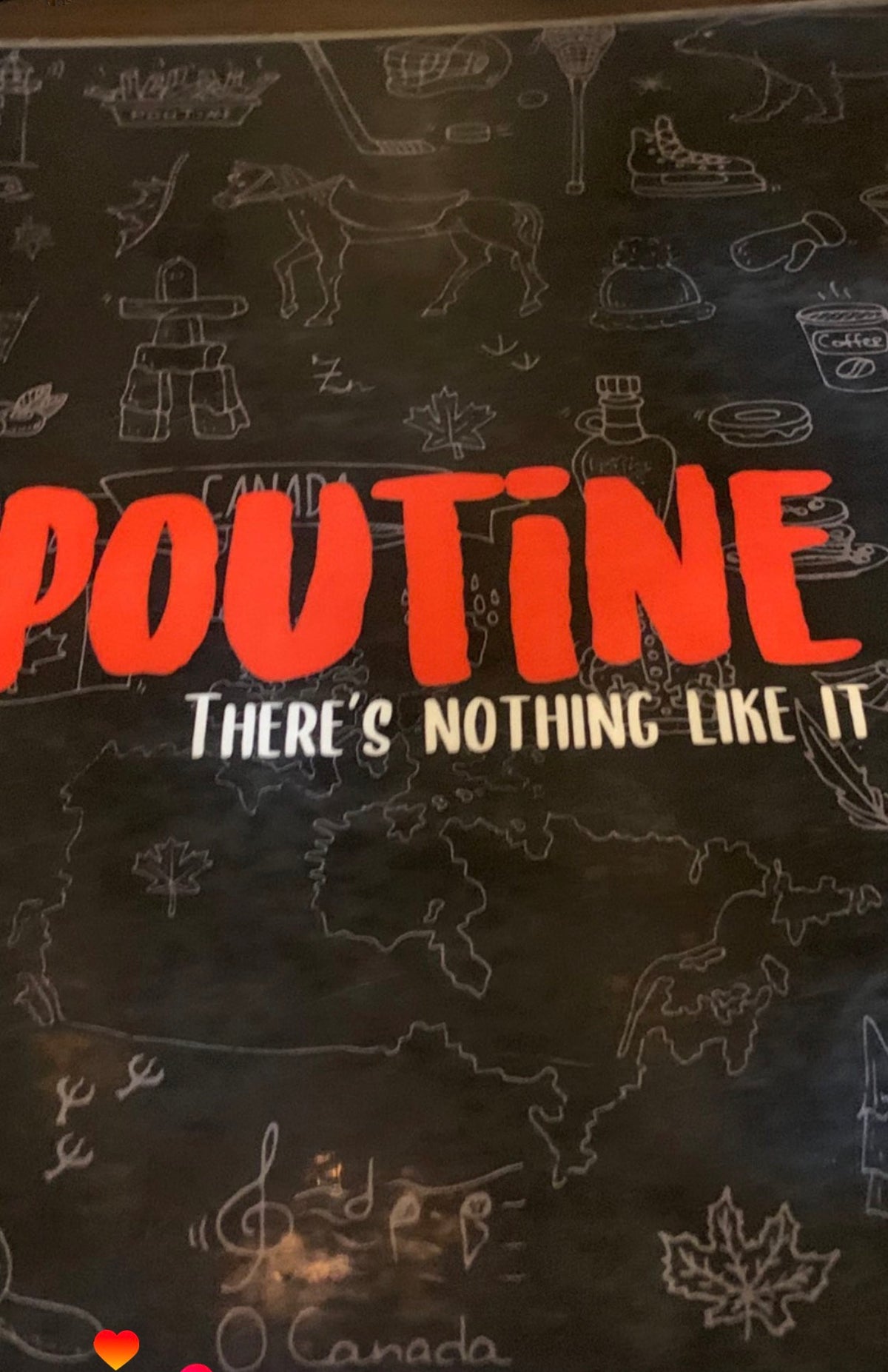 El Salvador: the sign of the poutine restaurant Mike Boisvert found in San Salvador. Photo by Mike Boisvert / The Skate Nomad