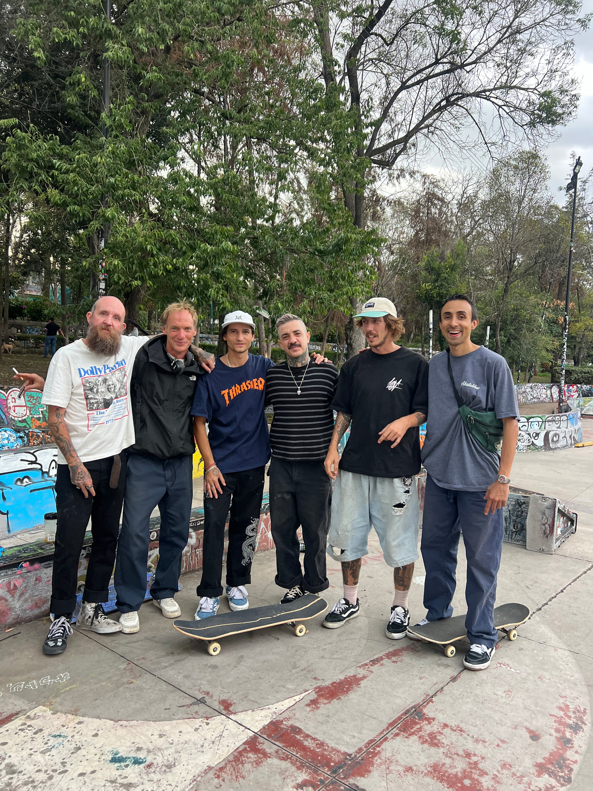 Skateboarding in Mexico: a crew of skaters lines up with their boards at a skatepark. Photo by Mike Boisvert / The Skate Nomad