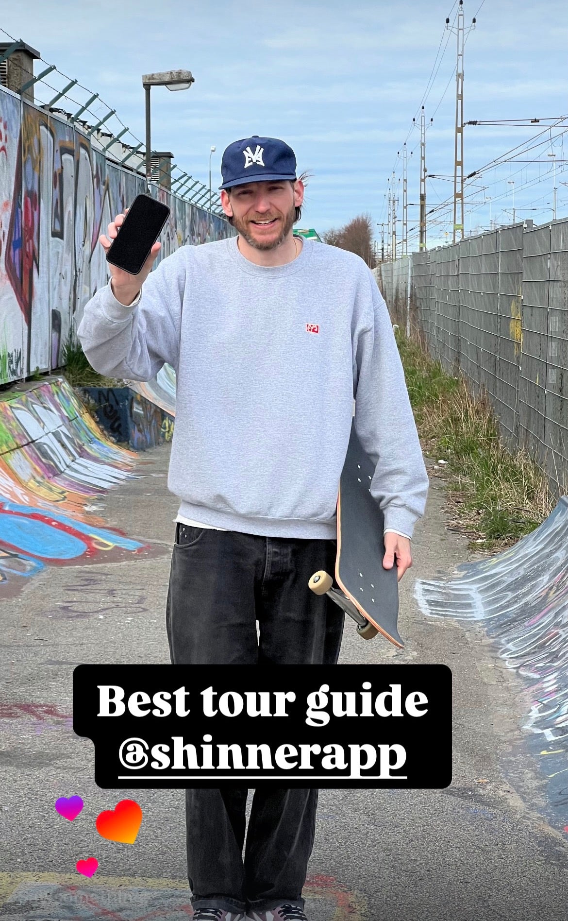 Skateboarding in Malmö, Sweden: Mike Boisvert with the Shinner spot app, his tour guide for the city. Photo by Mike Boisvert / The Skate Nomad