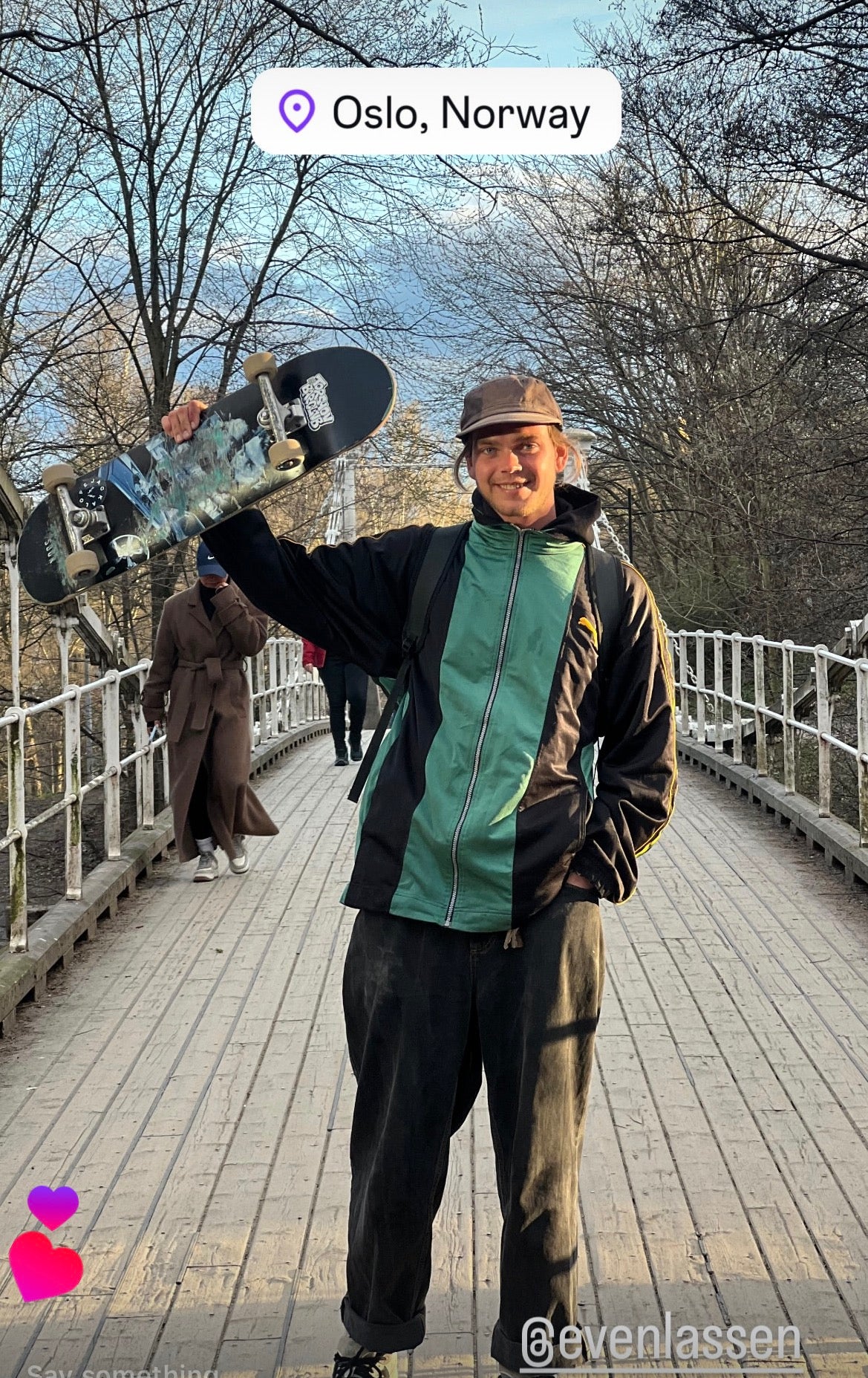 Skateboarding in Oslo, Norway: Mike Boisvert with his board on a wooden bridge in Oslo. Photo by Mike Boisvert / The Skate Nomad