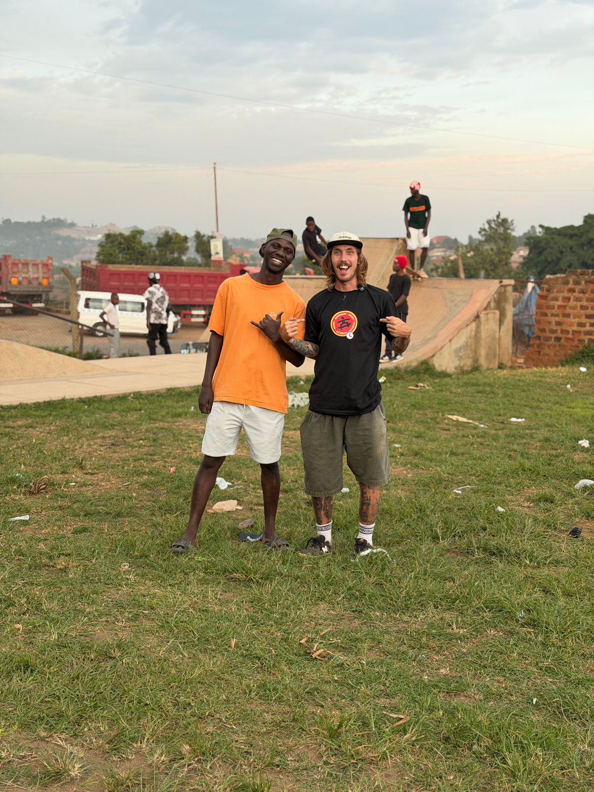 Skateboarding in Kampala, Uganda — Mike Boisvert with a local skater at the park — photo by Mike Boisvert / The Skate Nomad